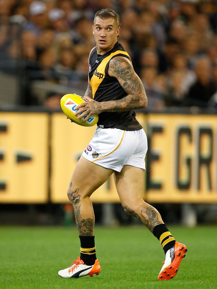 AFL 2016 Rd 02 - Collingwood v Richmond MELBOURNE, AUSTRALIA - APRIL 1: Dustin Martin of the Tigers in action during the 2016 AFL Round 02 match between the Collingwood Magpies and the Richmond Tigers at the Melbourne Cricket Ground, Melbourne on April 1, 2016. (Photo by Michael Willson/AFL Media)